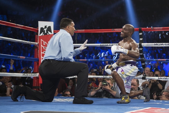 Timothy Bradley gets a countdown after getting knocked down by Manny Pacquiao in the 10th round of the WBO International welterweight championship boxing bout at the MGM Grand Garden ArenaSaturday ...