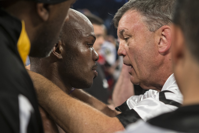 Timothy Bradley, left, speaks with with coach Teddy Atlas at the end of their WBO International welterweight championship boxing bout at the MGM Grand Garden ArenaSaturday, April 9, 2016, in Las V ...