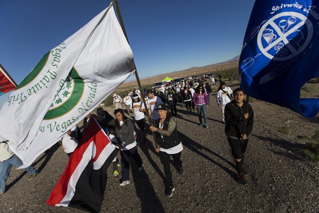 Attendees of the Gold Butte Culture Walk start the 11-mile hike to promote the need for a national monument for Gold Butte, which is a sacred area to the Southern Paiute people, on Saturday, April ...