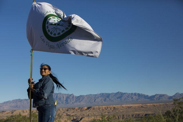 Linda Rae Linero holds the Las Vegas Paiute Tribe flag before the start of the Gold Butte Culture Walk, Saturday, April 23, 2016, in Gold Butte, Nevada. The fourth annual event is aimed at promoti ...