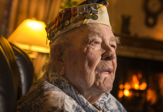 Clarendon"Clare" Hetrick, a sailor on the USS Arizona when the Japanese attacked Pearl Harbor, sits for a photo in the family's northwest Las Vegas home on Wednesday, Dec. 03, 2014. Hetrick died M ...