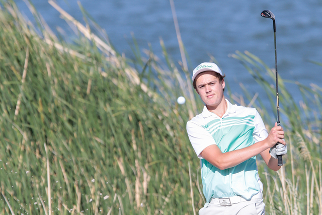 Palo Verde High School's Jack Trent, Hits his ball out of a rough spot during final round of Division I Sunrise and Sunset region boys golf tournament at Reflection Bay Golf Club, Lake Las Vegas, ...