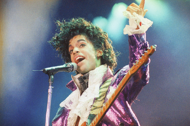 FILE - In this Feb. 18, 1985 file photo, Prince performs at the Forum in Inglewood, Calif. Prince, widely acclaimed as one of the most inventive and influential musicians of his era with hits incl ...