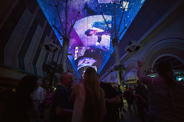 A tribute to Prince, who passed away at age 57, is shown at Fremont Street Experience in Las Vegas on Thursday, April 21, 2016. (Chase Stevens/Las Vegas Review-Journal) Follow @csstevensphoto