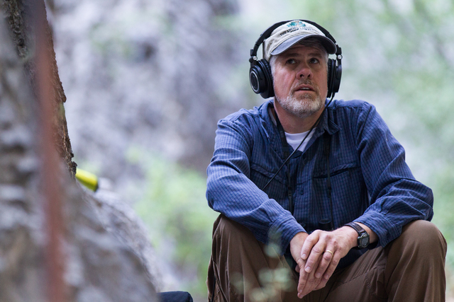 Fred Bell listens to the sounds of nature through his recording equipment in Fletcher Canyon at Mount Charleston on Thursday, June 19, 2014. Bell goes to various areas to record the sounds of natu ...