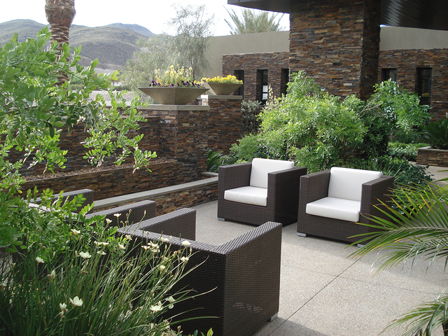 COURTESY OF SOUTHWICK LANDSCAPE ARCHITECTS
The owner wanted the front of the property to be very desert, and when you step through the metal gate it turns into a lusher and greener look,” said S ...