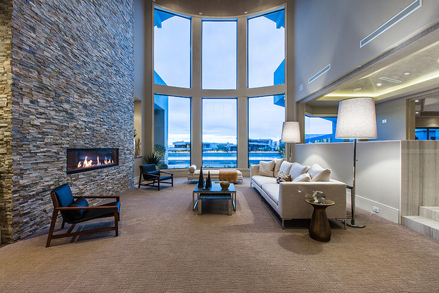 The home has a floor-to-ceiling brick fireplace. (Courtesy Shapiro & Sher Group)