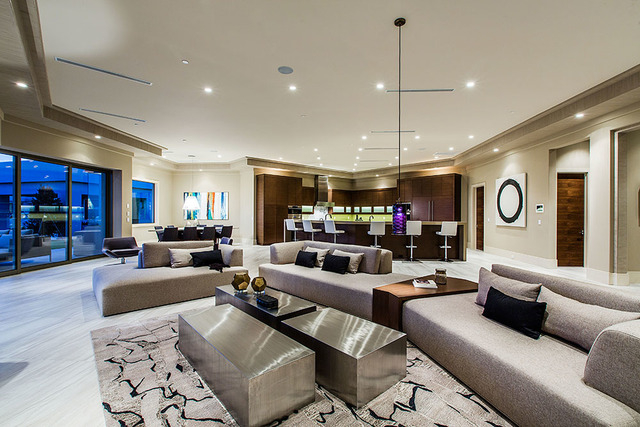 The large living area has a bar. (Courtesy Shapiro & Sher Group)