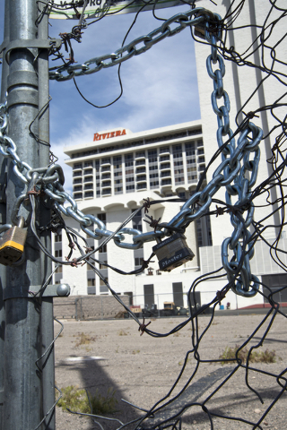 Chains and barbed wire block a hole in the fence at the site of the shuttered Riviera on the Las Vegas Strip on Tuesday, March 29, 2016. (Daniel Clark/Las Vegas Review-Journal Follow @DanJClarkPhoto)