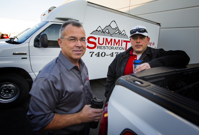 Ken Bagwell, left, general manager of Everest Construction and Will Dellaechaie, president of Summit Restoration and co-owner/managing member of Everest Construction, stand for a photo on Friday,  ...