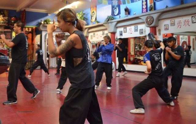 Teen and adult students practice Kung Fu at the Lohan School of Shaolin, 3850 Schiff Drive. Ginger Meurer/Special to View