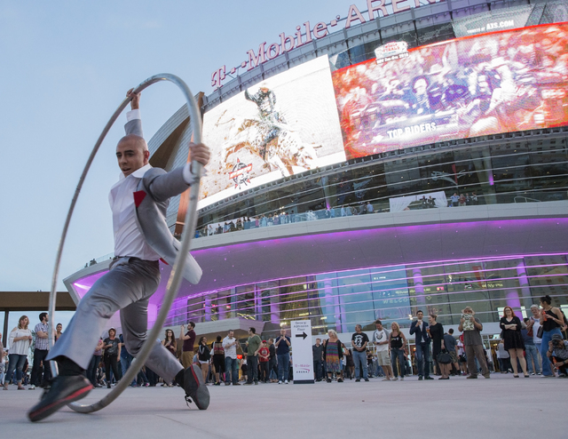 Jonas Woolverton performs on the cyr wheel outside T-Mobile Arena during opening night of the new Las Vegas entertainment venue on Wednesday, April 6, 2016. Highlights included performances by The ...