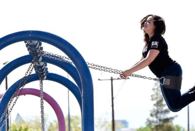 Michelle Rosario flies high on a swing at Freedom Park playground Tuesday, April 12, 2016, in Las Vegas. Highs above 80 degrees are expected on Wednesday with partly sunny skies. (David Becker/Las ...