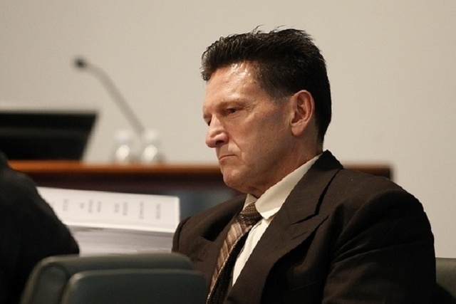 Family Court Judge Steven Jones attends his disciplinary hearing in Las Vegas Wednesday, Dec. 4, 2013. (John Locher/Las Vegas Review-Journal file)