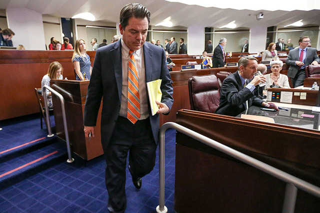 Nevada Senate Majority Leader Michael Roberson, R-Henderson, leaves the Senate chambers in Carson City, Nev., in this file photo. (Cathleen Allison/Las Vegas Review-Journal)