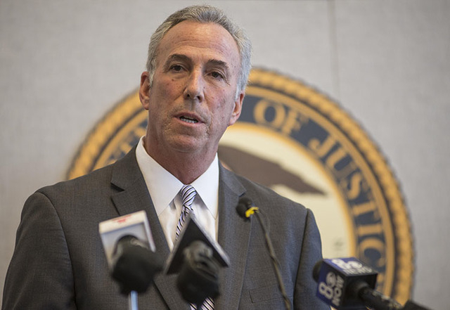 Steve Wolfson, Clark County District Attorney, speaks during a news conference on Thursday, Feb. 12, 2015, at the Lloyd D. George Federal Courthouse in Las Vegas to discuss ongoing efforts to prev ...