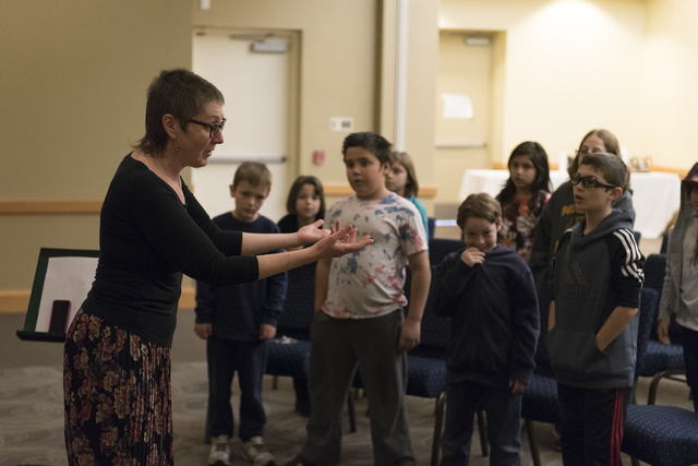 Laura Rosenberg, left, leads a group of children in a singalong of traditional Yiddish songs at Yiddish Las Vegas: A Music & Culture Festival at Temple Sinai in Las Vegas Sunday, April 10, 201 ...