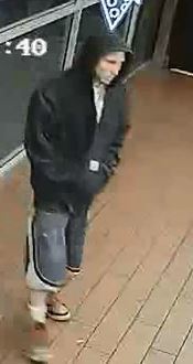 Police are seeking help finding the suspect who robbed a Domino’s Pizza restaurant on May 13. (Las Vegas Metropolitan Police Department)