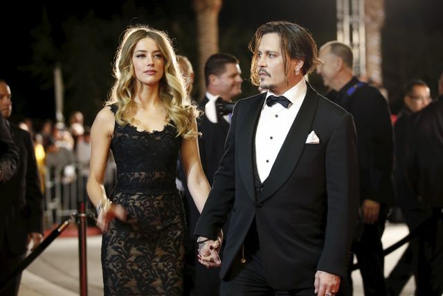 Desert Palm Achievement Award recipient actor Johnny Depp and wife actress Amber Heard pose at the 27th Annual Palm Springs International Film Festival Awards Gala in Palm Springs, California, Jan ...