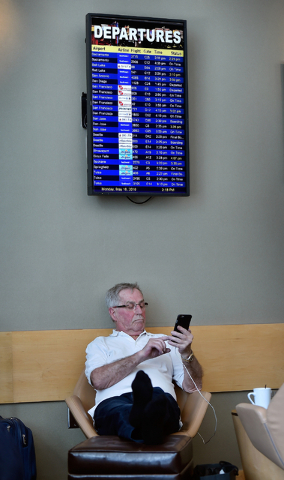 Bjarne Stub Hansen of Sweden relaxes inside The Club at LAS as he waits for his outbound flight at McCarran International Airport Monday, May 16, 2016, in Las Vegas. David Becker/Las Vegas Review- ...
