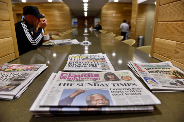International newspapers are available for travelers inside The Club at LAS at McCarran International Airport Monday, May 16, 2016, in Las Vegas. David Becker/Las Vegas Review-Journal Follow @davi ...