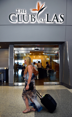 A woman walks by The Club at LAS at McCarran International Airport Monday, May 16, 2016, in Las Vegas. David Becker/Las Vegas Review-Journal Follow @davidjaybecker