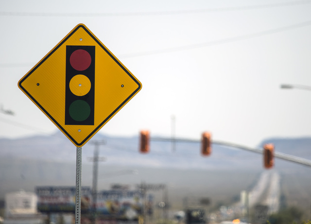 The first traffic light in Baker, Cal.  is seen on Monday, May, 23, 2016. The owner of Baker Travel Plaza spent four years trying to install the signal because it is cheaper than a traffic mitigat ...