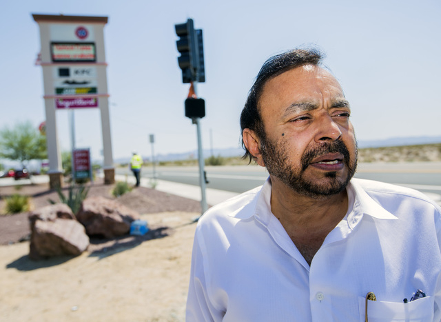 Ravinder Grewal, owner of the Baker Travel Plaza stand near the first traffic light in Baker, Cal. on Monday, May, 23, 2016. Grewal spent four years trying to install the signal because it is chea ...
