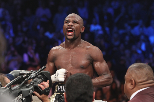 Floyd Mayweather Celebrates With Belts Poster 
