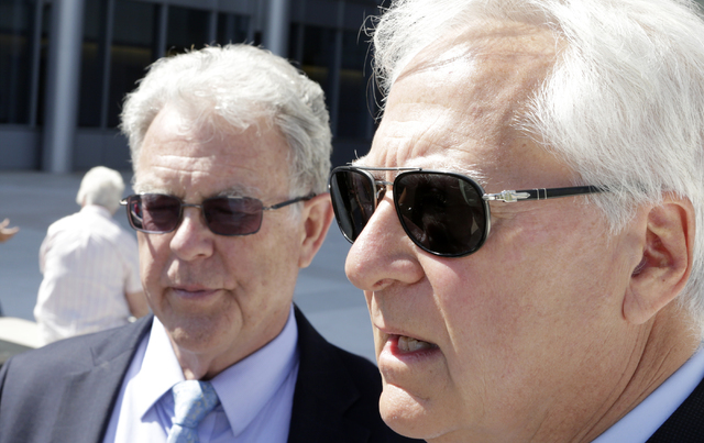 Washington attorney Larry Klayman, right, and Cliven Bundy's attorney Joel Hansen address the media outside Lloyd George U.S. Courthouse on Wednesday, May 25, 2016. Chief U.S. District Judge Glori ...