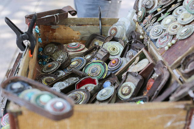 Christopher Reitmaier makes jewelry from reclaimed objects in front of the Bellagio hotel-casino on the Strip in Las Vegas on Friday, May 27, 2016. (Brett Le Blanc/Las Vegas Review-Journal) Follow ...