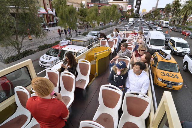 Passengers are shown on a double-decker bus during a Big Bus tour of the Strip in Las Vegas on Wednesday, March 9, 2016. Bill Hughes/Las Vegas Review-Journal