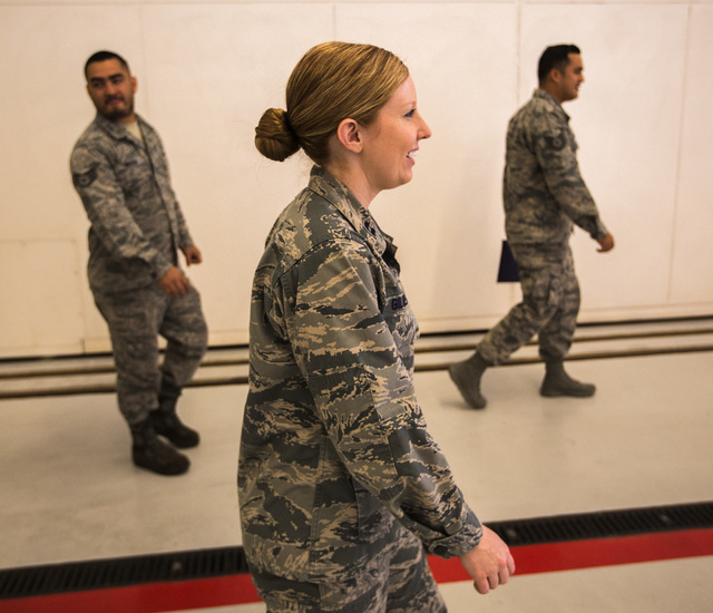 Capt. Madison Gilbert, officer in charge at the 757th Aircraft Maintenance Squadron, walks in the hanger  on Wednesday, April 27, 2016. (Jeff Scheid/Las Vegas Review-Journal) Follow @jlscheid