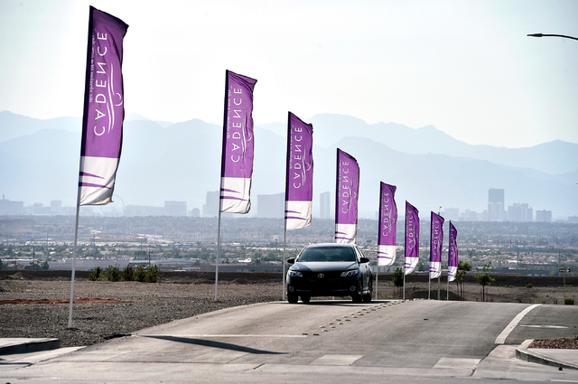 A car travels near a new home development Monday, May 23, 2016, in Henderson. Newly released U.S. Census data puts Las Vegas in the 28th most populous spot among American cities. David Becker/Las ...
