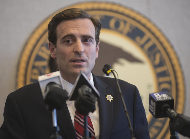 Adam Laxalt, Nevada Attorney General, speaks during a news conference on Thursday, Feb. 12, 2015, at the Lloyd D. George Federal Courthouse in Las Vegas to discuss ongoing efforts to prevent the s ...