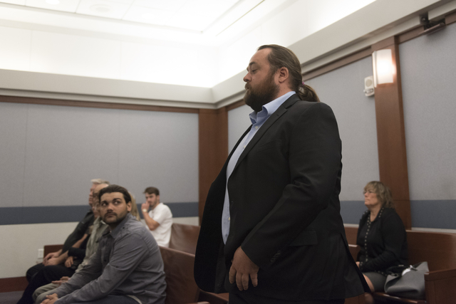 Austin Lee "Chumlee" Russell approaches Judge Joseph S. Sciscento in court at the Regional Justice Center in Las Vegas Monday, May 23, 2016. The reality TV actor from "Pawn Stars" is facing gun an ...