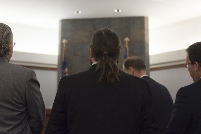 Austin Lee "Chumlee" Russell, center, stands before Judge Joseph S. Sciscento with his attorneys in court at the Regional Justice Center in Las Vegas Monday, May 23, 2016. The re ...