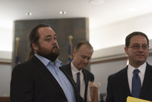 Austin Lee "Chumlee" Russell, left, exits his courtroom at the Regional Justice Center in Las Vegas Monday, May 23, 2016. The reality TV actor from "Pawn Stars" ...