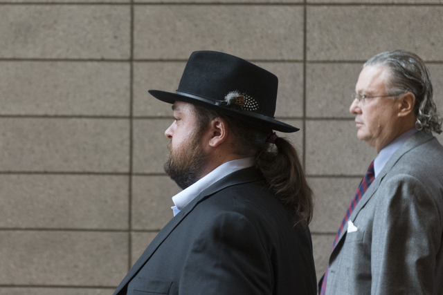 Austin Lee "Chumlee" Russell, left, and his attorney, David Chesnoff, exit the Regional Justice Center in Las Vegas Monday, May 23, 2016. The reality TV actor from "Pawn ...