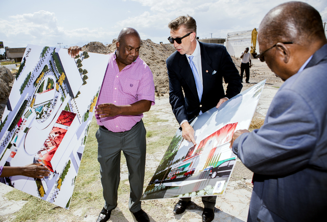 Architect Edward Vance, center, discusses the proposed new Moulin Rouge Las Vegas while Scott Johnson, left, president of Moulin Rouge Holdings, and Gene Collins, vice president of Moulin Rouge Ho ...