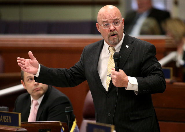 Nevada Assemblyman Ira Hansen, R-Sparks, speaks on the Assembly floor at the Legislative Building in Carson City, Nev., on Tuesday, Feb. 17, 2015. Hansen spoke in support of a construction defect ...