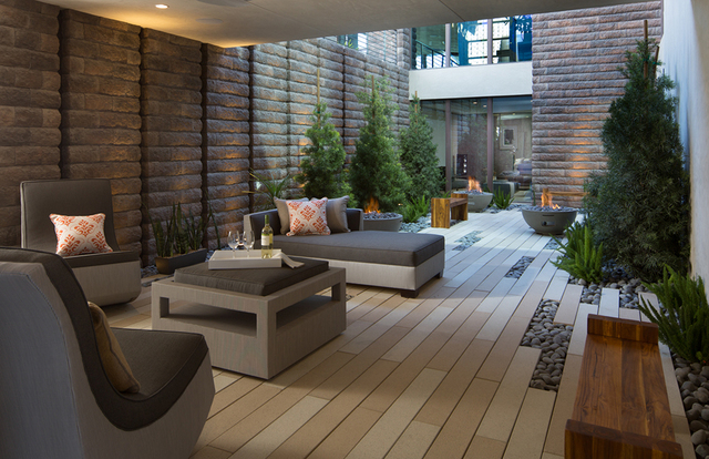 Josh Moser, 33, designed the 2016 New American Home in MacDonald Highlands while working for Element Design-Build last year. The home, which features this interior courtyard, was showcased during  ...