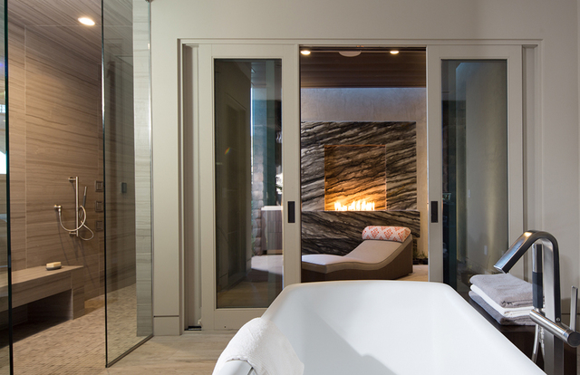 The master bath of the 2016 New American Home opens out to a relaxation area. (COURTESY OF JEFF DAVIS PHOTOGRAPHY)
