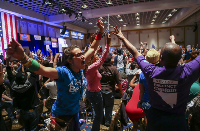 Supporters of Democratic presidential candidate Bernie Sanders react during the Nevada State Democratic Partyճ 2016 State Convention at the Paris hotel-casino in Las Vegas on Saturday, May 1 ...