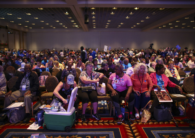 Supporters of Democratic presidential candidate Hillary Clinton talk with one another during the Nevada State Democratic Partyճ 2016 State Convention at the Paris hotel-casino in Las Vegas o ...