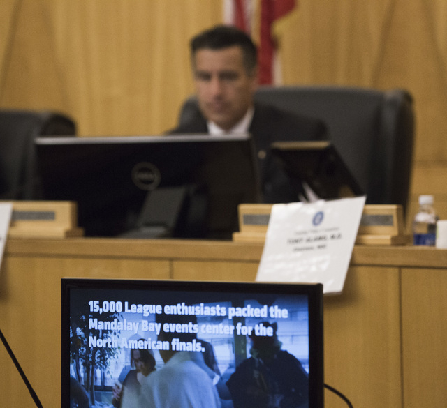 Nevada Gov. Brian Sandoval watches a video on e-sports during the Gaming Policy Committee meeting at the Clark County Commission chambers, 500 S. Grand Central Pkwy. on Friday, May 13, 2016. Jeff  ...