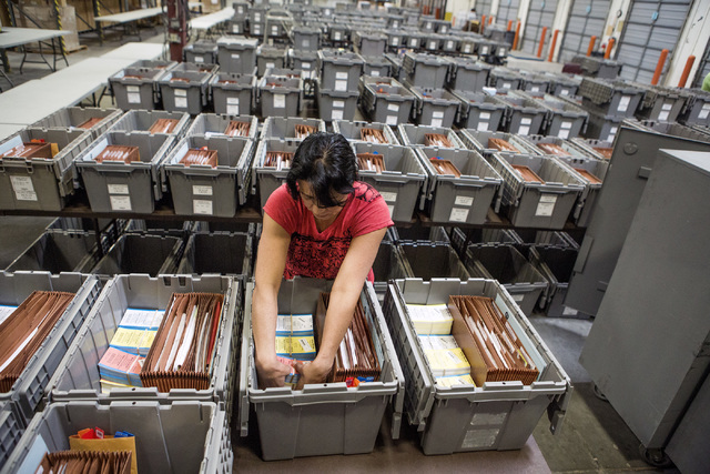 Maria Valdez, checks supplies in a team leader pickup crate at the Clark County Elections Department warehouse, 965 Trade Drive, North Las Vegas, on Thursday, May 12, 2016. Jeff Scheid/Las Vegas R ...