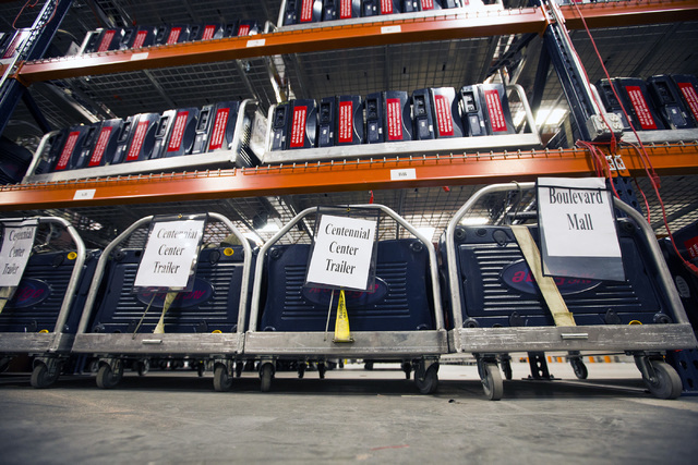 A secured and certified voting machines sits on a carts at the Clark County Elections Department warehouse, 965 Trade Drive, North Las Vegas, on Thursday, May 12, 2016. Jeff Scheid/Las Vegas Revie ...