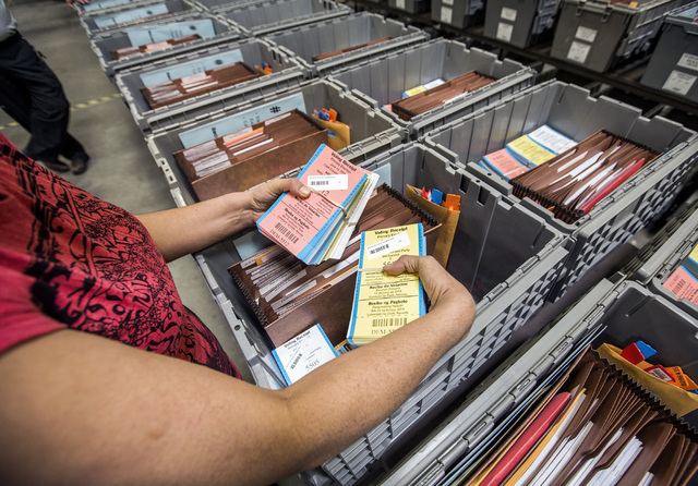 Maria Valdez, checks supplies in a team leader pickup crate at the Clark County Elections Department warehouse, 965 Trade Drive, North Las Vegas, on Thursday, May 12, 2016. Jeff Scheid/Las Vegas R ...