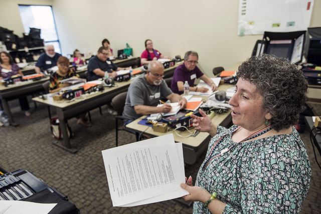 Election program supervisor Maria Tsarouhas, right, conducts training for poll workers at the Clark County Elections Department warehouse, 965 Trade Drive, North Las Vegas, on Thursday, May 12, 20 ...